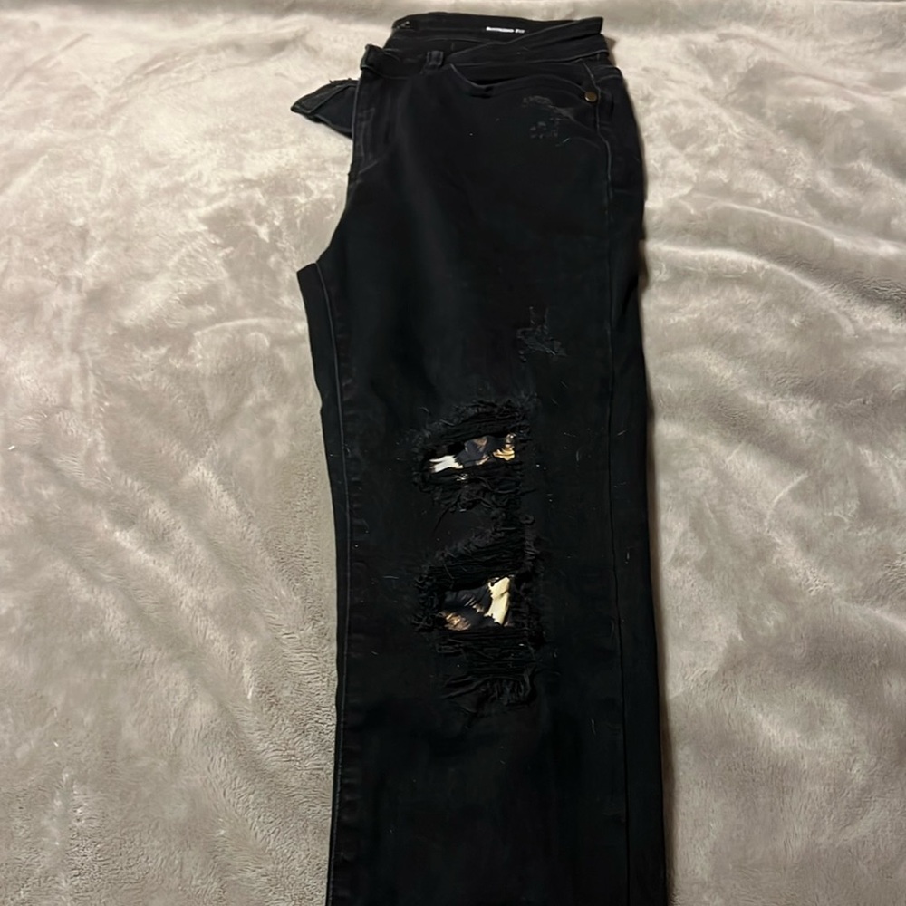 Boyfriend for Lularoe. Black jeans with distressing and a leopard underlay